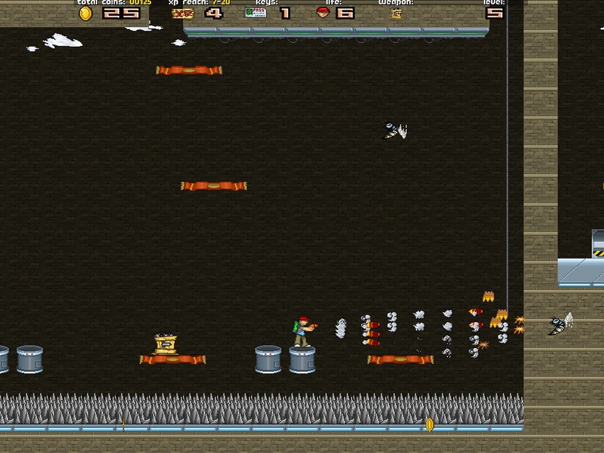 Firing a spread of rockets in a dark brick shaft over the spikes